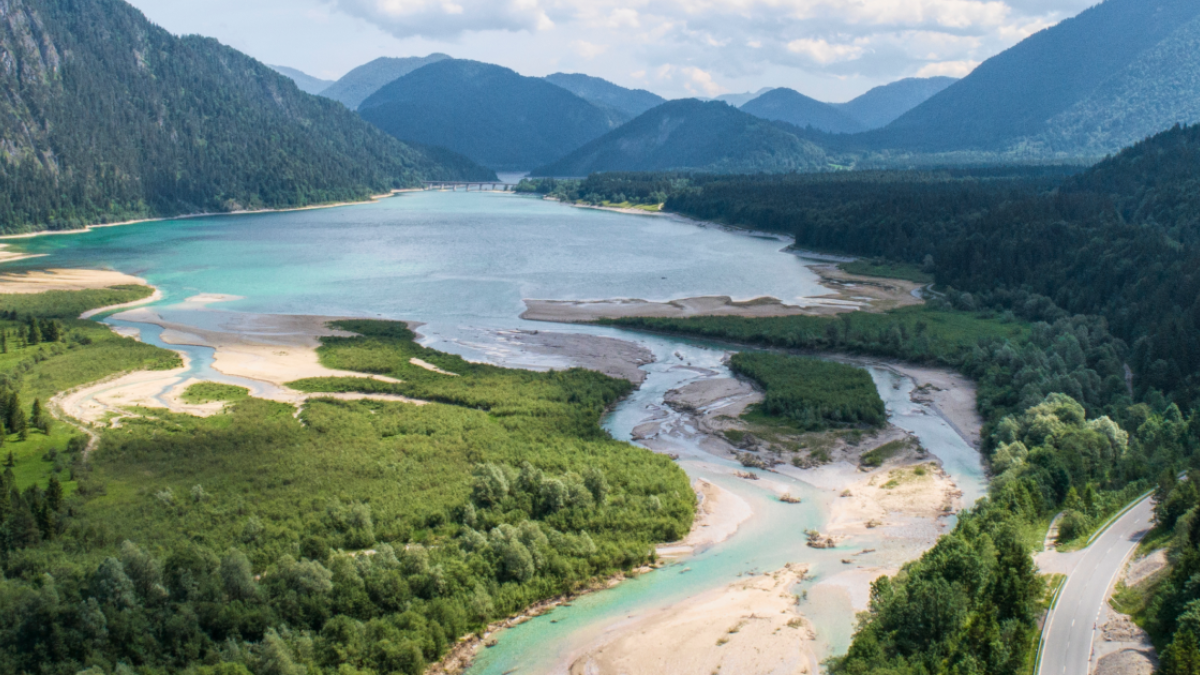 Arial view of a lake with mountains